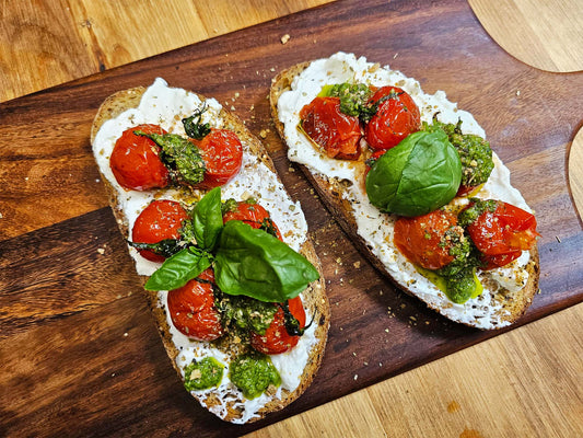 Homemade pesto, tomatoes and ricotta on toast